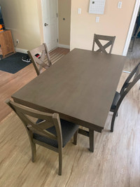Dining room table with 4 chairs and a bench