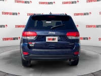 This outstanding example of a 2015 Jeep Grand Cherokee Laredo is offered by Stampede Auto. The Jeep... (image 3)