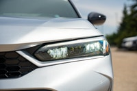 Passenger Illuminated Visor Mirror,Traction Control,Heated Mirrors,Pass-Through Rear Seat,Power Stee... (image 3)