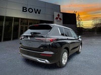 The 2026 Mitsubishi Outlander SE S-AWC in a striking exterior color pairs All-Wheel Drive with excep... (image 4)