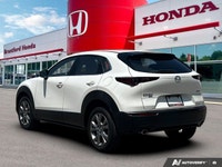 Navigate your world with sophistication and confidence in the 2025 Mazda CX-30 GS Sport Utility. Thi... (image 4)