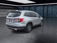 The 2021 Honda Pilot Touring 8-Passenger AWD in Silver is an exceptional choice for those seeking a... (image 7)