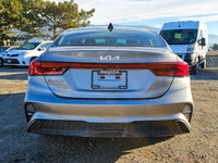 Experience the sophisticated charm of the 2024 Kia Forte LX IVT, presented in a sleek Gray finish wi... (image 5)