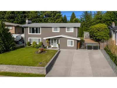 Room for the whole family, the RV, & room to enjoy life! This well-loved East Abbotsford home offers...