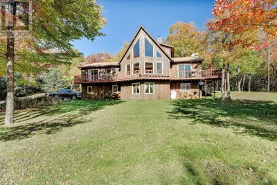 Stunner on over two private acres with southern exposure overlooking the rolling hills of New Glasgo...