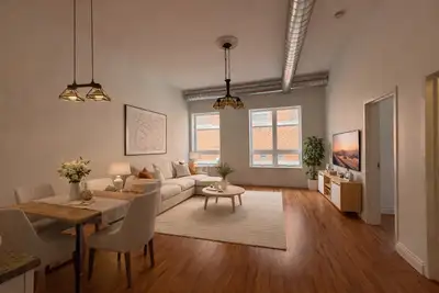 Unique industrial-style apartment featuring 1 bedroom and 1 bathroom. Soaring ceilings with loft sty...