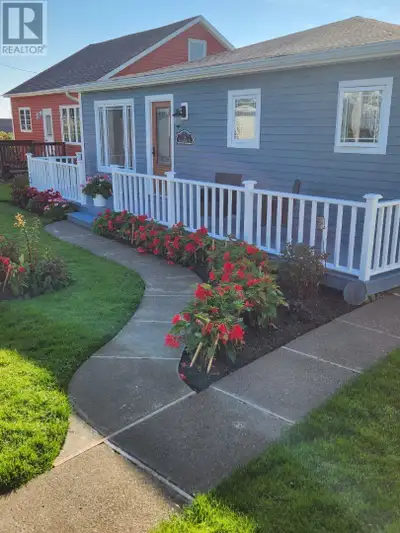 Cozy and inviting are just two words to describe this very well maintained two bedroom bungalow loca...