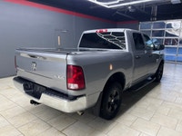 The 2023 Ram 1500 Classic SLT, with its stunning silver finish and robust 44 drivetrain, effortlessl... (image 6)