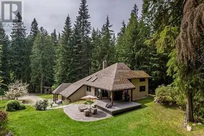 Welcome to your own private paradise just steps from the shores of Kootenay Lake at 9 mile! Only 12...