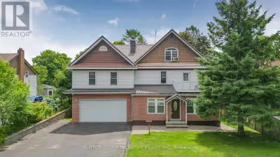 Nestled on a generous 67.5 x 165 ft lot with seasonal lake views, this meticulously crafted & fully...
