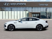 Step into sophistication with the 2025 Hyundai Sonata Preferred-Trend, featuring a luxurious panoram... (image 1)