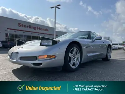 Turn heads in this sleek 1999 Chevrolet Corvette, boasting a stunning Sebring Silver Metallic exteri...