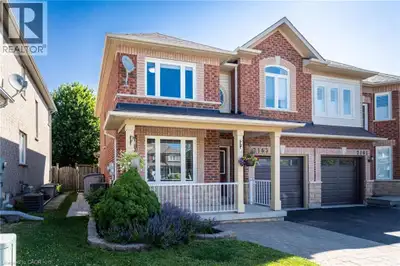 Welcome to 2163 Sutton Drive in Burlington. This immaculately maintained 3-bedroom, 2.5-bathroom sem...