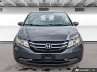 Experience the comfort and practicality of this pre-owned minivan, finished in elegant Alabaster Gre... (image 7)