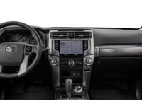 Experience the robust performance and versatility of the 2022 Toyota 4Runner 4WD in a striking white... (image 6)