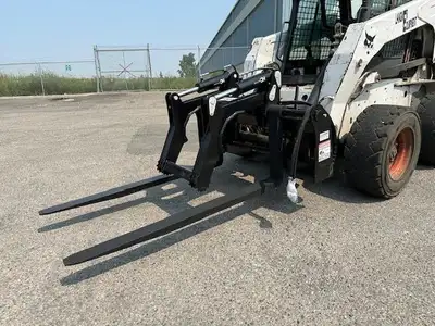 CANADIAN MADE! 57" FRAME, 42" OPENING, 60" TINES, 6000 LB CAPACITY, 789 LBS. Fits skid steers and lo...
