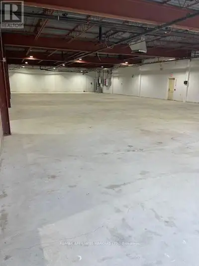 This offering is an approximate 27,600 sq ft light industrial building with 2 dock level and 2 drive...