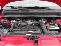 The 2011 Kia Soul 2u in a vibrant red with front-wheel drive is a vehicle built for handling the dem... (image 8)