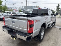 This outstanding example of a 2023 Ford Super Duty F-350 SRW XLT is offered by Stampede Auto. Sophis... (image 3)