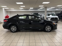 Among compact hybrid sedans, many chase headlines with flash or sheer output; this 2024 Toyota Corol... (image 6)