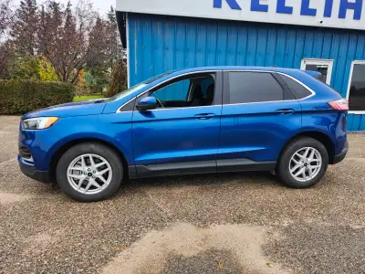 2024 Edge SEL AWD, 2.0L ecoboost, rear camera, power tailgate, heated/power seats, remote start and...