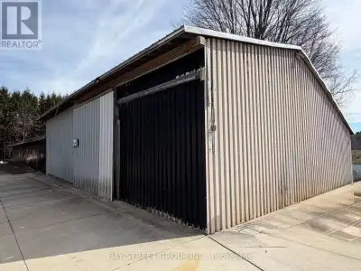 Located on the west side of Cherry Hill Road. Rare Freestanding Industrial Building in Thams Centre....