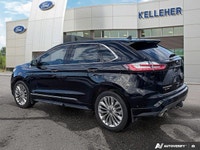 Experience effortless journeys in this sleek Black 2021 Ford Edge Titanium AWD. With just 40,149 kil... (image 2)