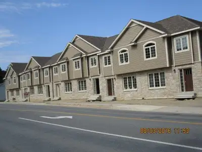 4 bedroom townhouses 2.5 bathrooms 2Fridges(18 cubic ft each) washer & dryer in each unit unfinished...
