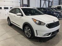 Le Kia Niro 2017 SX TOURING CUIR TOIT MAGS CAMERA RECUL CRUISE offert chez AutoStudio 72 à Mirabel e... (image 6)