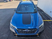 The 2022 Subaru Outback Wilderness in a striking blue finish with an all-wheel-drive system is your... (image 4)