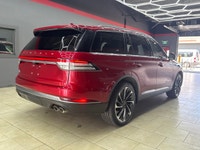 Experience the sophisticated elegance of the 2020 Lincoln Aviator Reserve in a stunning red exterior... (image 5)