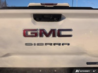 Experience the power and versatility of the 2026 GMC Sierra 1500 Elevation, a new white Crew Cab Sho... (image 9)