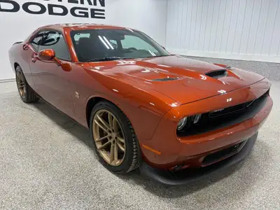 This 2023 Dodge Challenger in the absolutely stunning “Sinamon Stick” colour is pure muscle car atti...