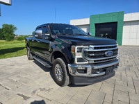 2020 Ford F-250 Super Duty Lariat 4WD Crew Cab equipped with the 6.7L Power Stroke Diesel and 201,00... (image 2)