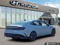 The 2024 Hyundai Sonata Preferred-Trend AWD, finished in pristine Serenity White with a sophisticate... (image 4)