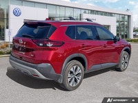Experience enhanced visibility and an open-air feel in this stunning red 2021 Nissan Rogue SV, featu... (image 4)