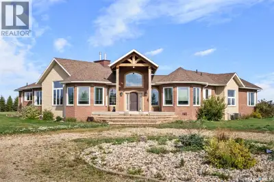 Welcome to luxury country living just outside the town of Kamsack, SK, where you overlook the town a...