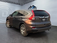 Experience year-round confidence and everyday versatility in this 2016 Honda CR-V LX AWD. Powered by... (image 6)
