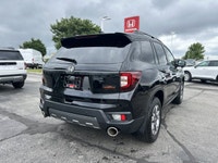 Conquer every adventure with the rugged yet refined 2023 Honda Passport TrailSport, a vehicle engine... (image 4)