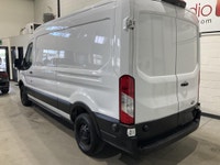 Le Ford Transit 2019 version T-250 toit moyen 148 po PNBV de 9 000 lb porte coulissante côté passage... (image 1)