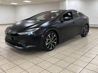 Rush-hour traffic slows to a crawl, but the cabin around you feels more like a modern tech lounge th... (image 1)