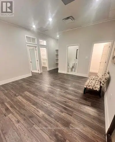 Welcome to a premier commercial condo at 208-3495 Rebecca Street, situated in the vibrant heart of S...