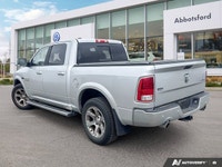 Command your day with this robust 2017 Ram 1500 Laramie Crew Cab Pickup. Powering through tasks or c... (image 2)
