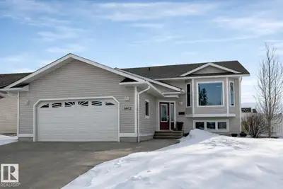 Just up the road from the beach! This fully finished home on a big corner lot (with no sidewalks to...