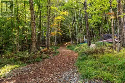 Tucked away on a stunning 26.68-acre canvas of natural beauty, this property boasts over 1,000 feet...