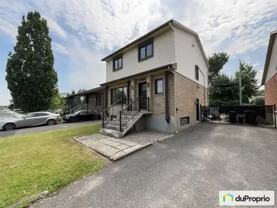 Découvrez cette chaleureuse demeure de 1 448.82 pi², située dans un secteur paisible en plein coeur...