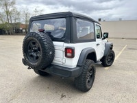 This Jeep Wrangler Sport 4x4 6 Speed Manual delivers a Regular Unleaded V-6 3.6 L/220 engine powerin... (image 4)