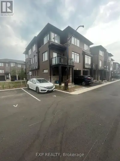 Welcome to 575 Woodward Avenue Unit #72 a bright and modern end-unit townhouse located in a family-f...