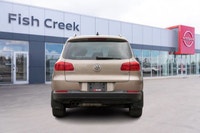 Navigate every road with confidence in this sophisticated 2015 Volkswagen Tiguan Comfortline. Engine... (image 5)