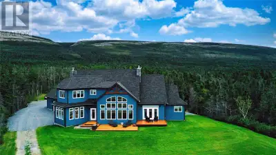 Visit REALTOR website for additional information. Welcome to this exquisite oceanfront executive hom...